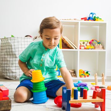 4 year old boy playing with building toys 4 year old boy playing with building toys