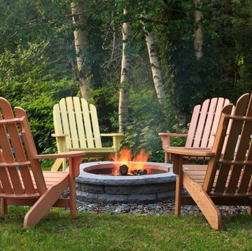 adirondack chairs around bonfire