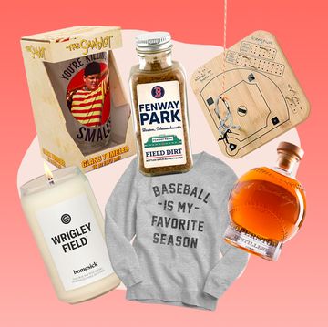 homesick wrigley field candle, mash and grape cooperstown distillery doubleday bourbon in a baseball decanter, boston red sox fenway park game used dirt bottle, baseball is my favorite season sweatshirt, baseball ring toss game