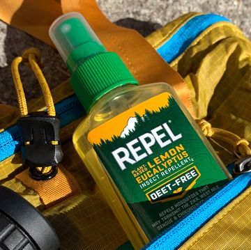 repel deet free natural bug spray in backpack with binoculars and water bottle