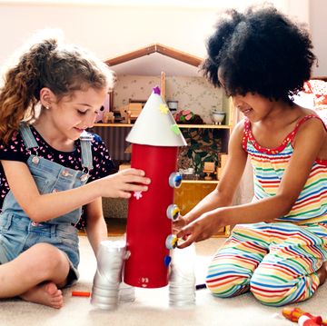 girls playing with homemade rocket