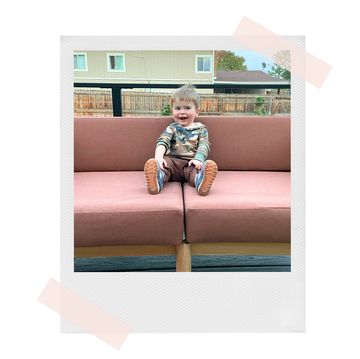 toddler sitting on neighbor outdoor sofa