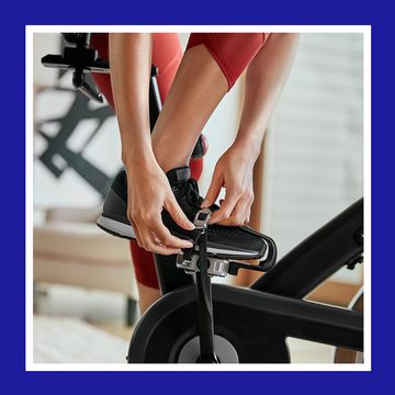 woman using schwinn indoor cycling bike