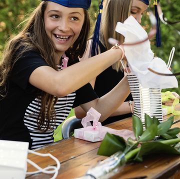 teenage girls graduation from primary school party in backyard