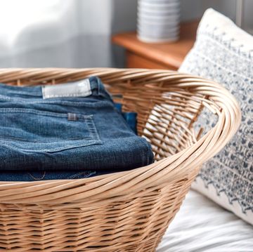 jeans in wicker laundry basket jeans in wicker laundry basket