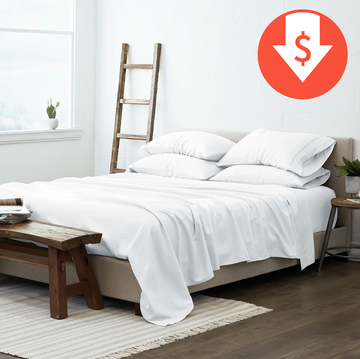 white sheet set on bed white sheet set on bed