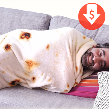 man wrapped in tortilla blanket on couch man wrapped in tortilla blanket on couch
